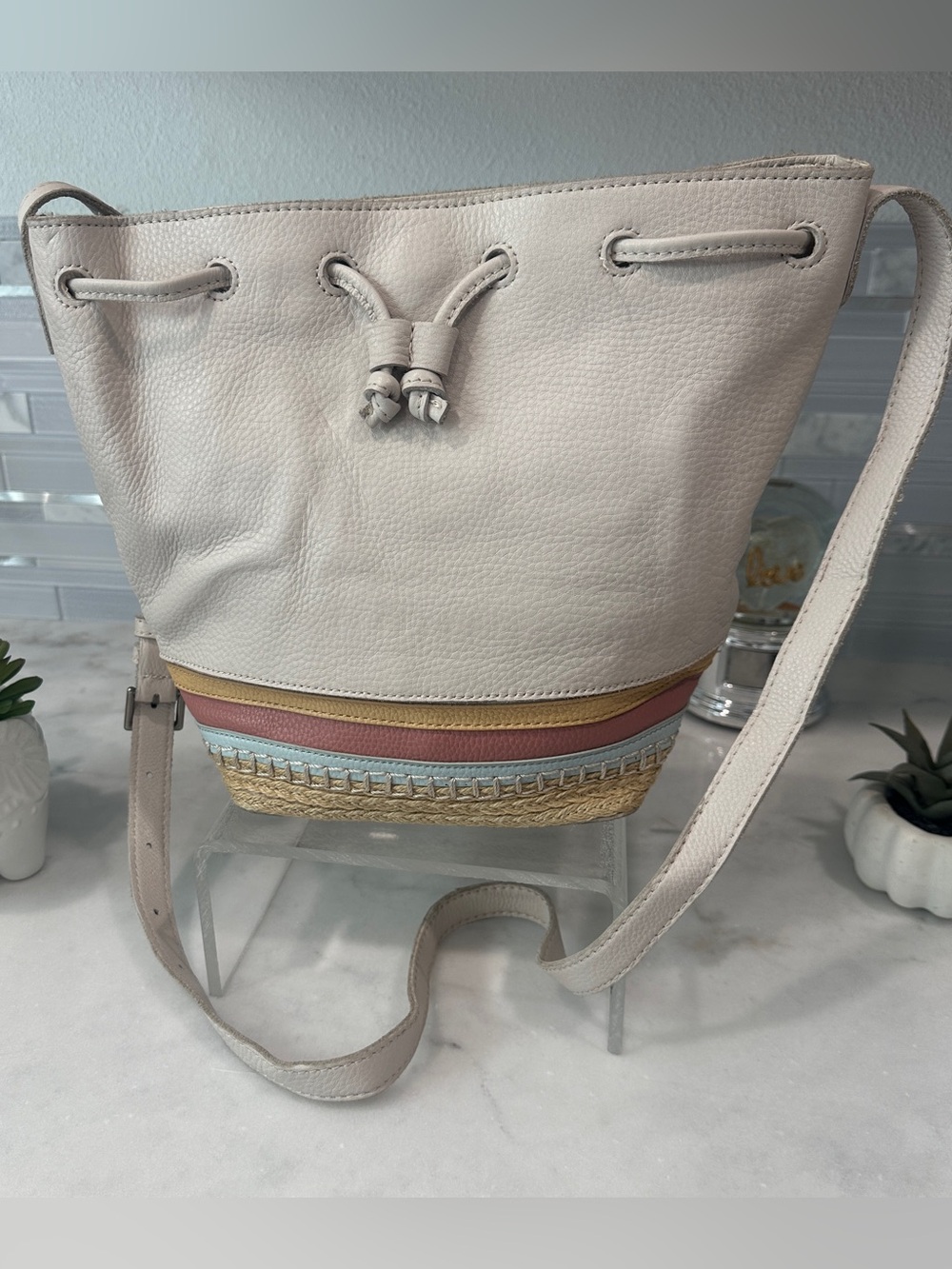 The Sak Ivy Leather Drawstring Bucket Bag cream coastal with striped woven trim - Picture 3 of 13